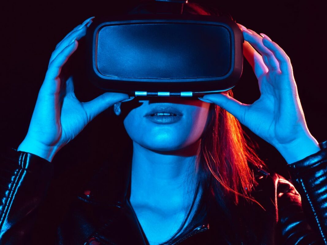 woman looking through a vr headset